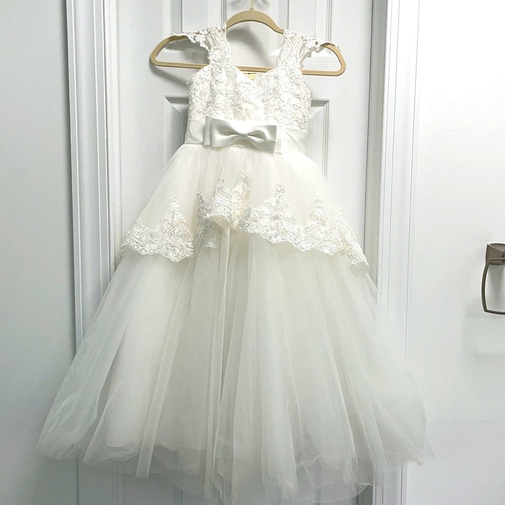 Off white ball gown style flower girl dress